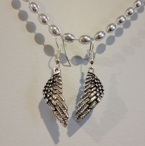 Brand new handmade angel wing hypoallergenic earrings